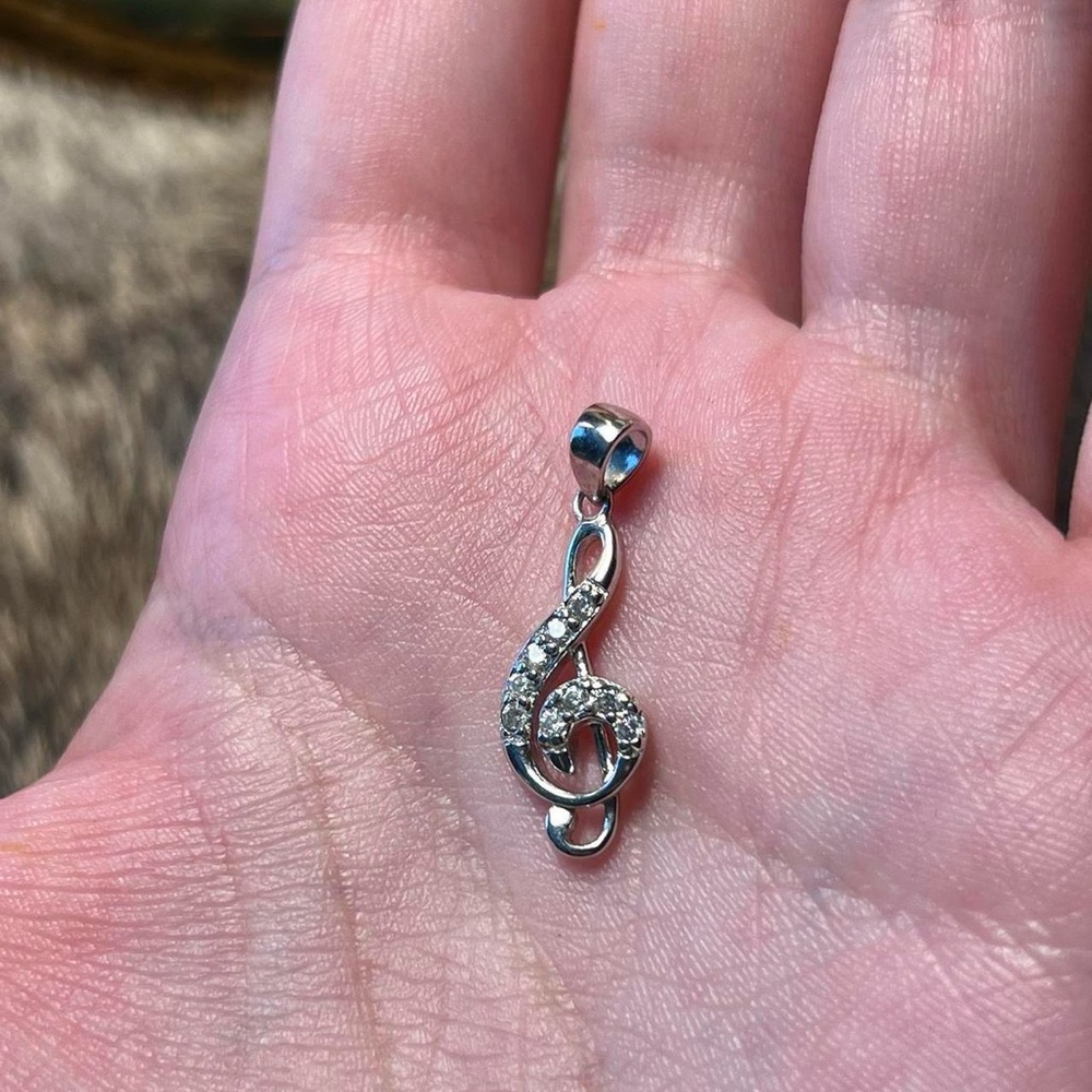Sterling silver cubic zirconium music note pendant